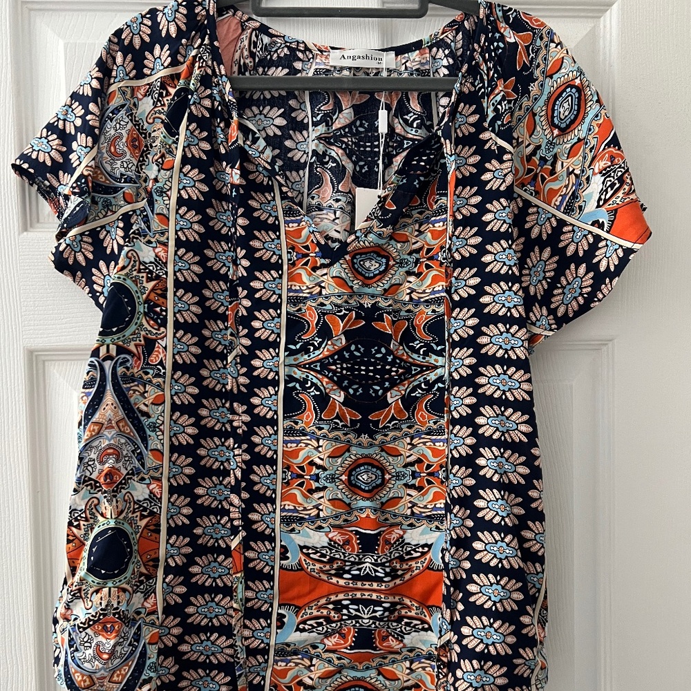 Angashion Women's Summer Tops Casual Floral Print V Neck Ruffle Short Sleeve